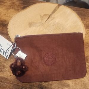 NWT Kipling Maroon Thin Nylon Pouch with Keychain 7.5" L X 5"H